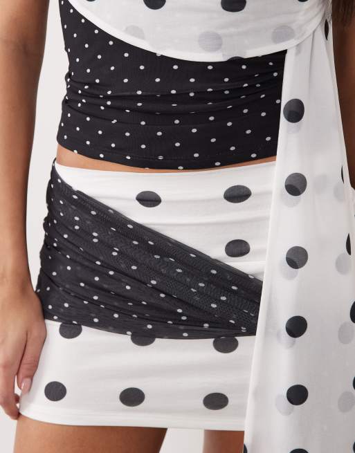 Minifalda monocromática con estampado de lunares variados de ASOS DESIGN, 4 de 5