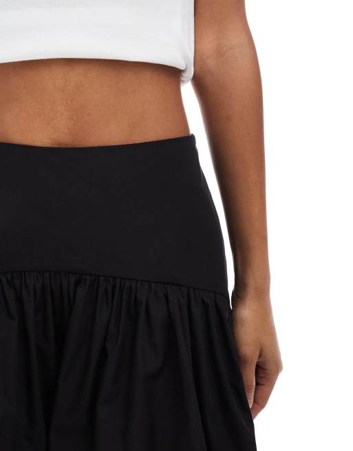 Minifalda negra con cintura baja de ASOS DESIGN, 4 de 5