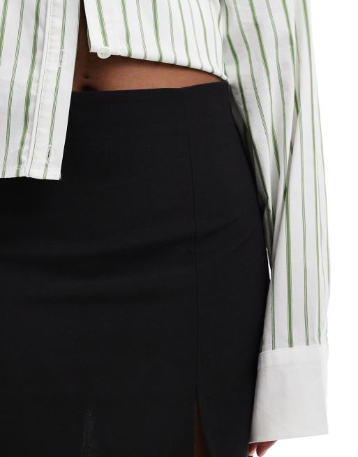 Minifalda negra con detalle de abertura de bengalina de ASOS DESIGN, 3 de 5
