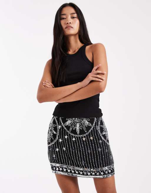 Minifalda negra con diseño cósmico y detalle de abalorios de ASOS DESIGN, 4 de 4