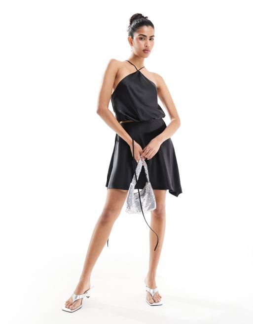 Minifalda negra con lazada lateral de satén de ASOS DESIGN (parte de un conjunto)