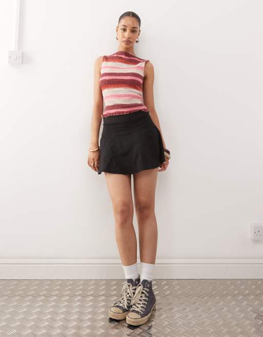 Minifalda negra con vuelo y godets de Reclaimed Vintage