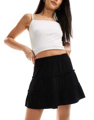 Minifalda negra escalonada de ASOS DESIGN - view 1