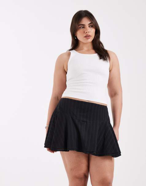 Minifalda negra texturizada con cintura baja e inserto de encaje de ASOS DESIGN Curve - view 1