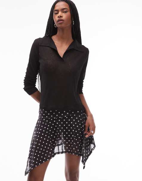 Minifalda pantalón negra con estampado de lunares blancos y bajo asimétrico de malla de ASOS DESIGN - view 1