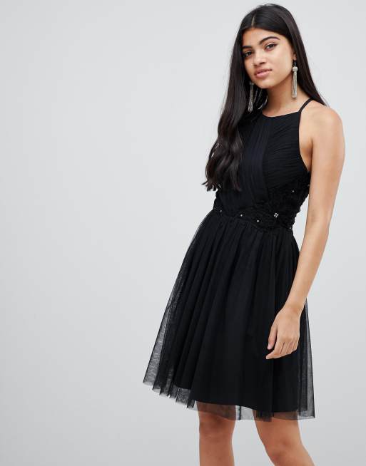 Minivestido skater plisado en negro de Little Mistress