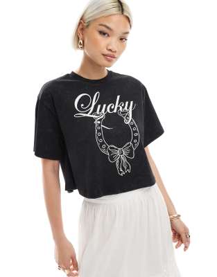 acid wash lucky horseshoe loose wide cropped tee in black