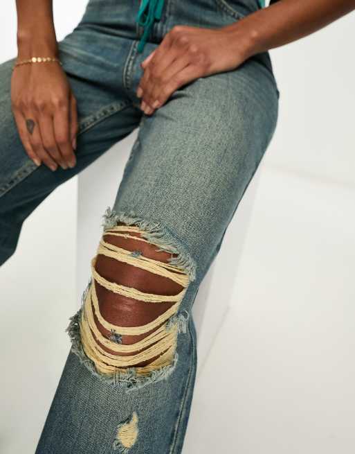 Knee torn hot sale jeans