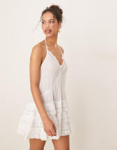 ASOS DESIGN lace bust mini dress with ruffle hem in peach