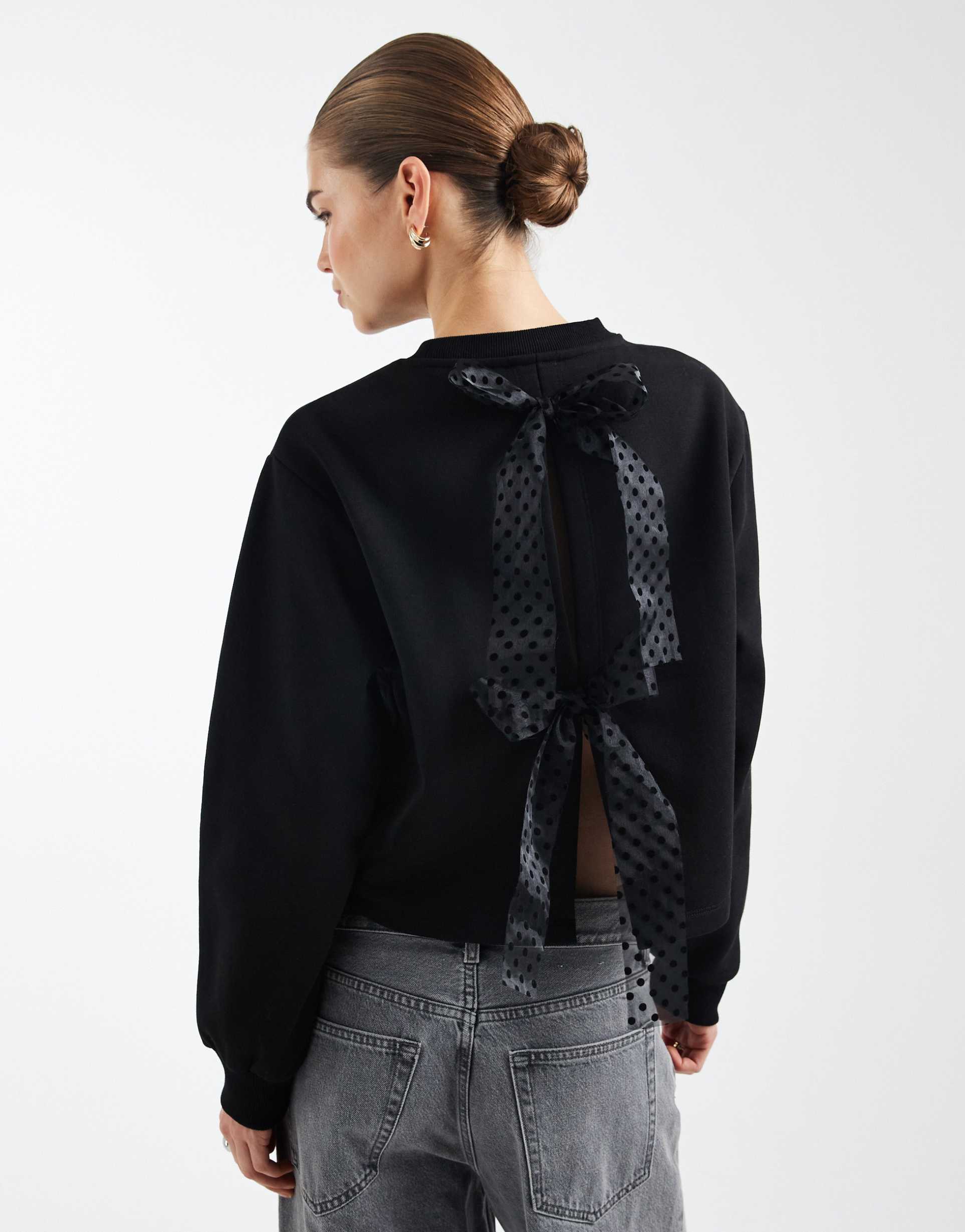 miss selfridge bow back sweatshirt in black