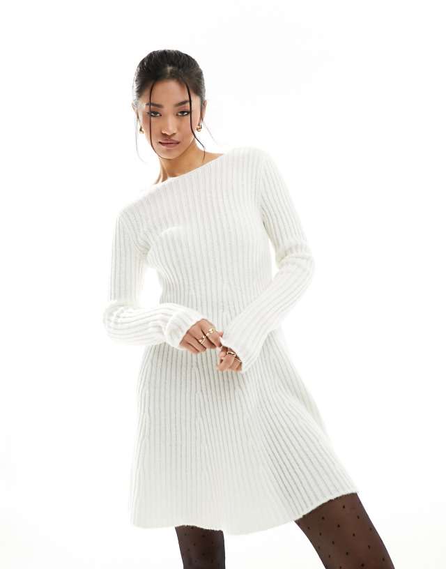 Miss Selfridge - bow tie back knitted flippy dress in cream