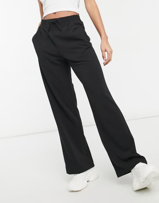 Miss Selfridge - Broek met wijde pijpen van scubastof in zwart