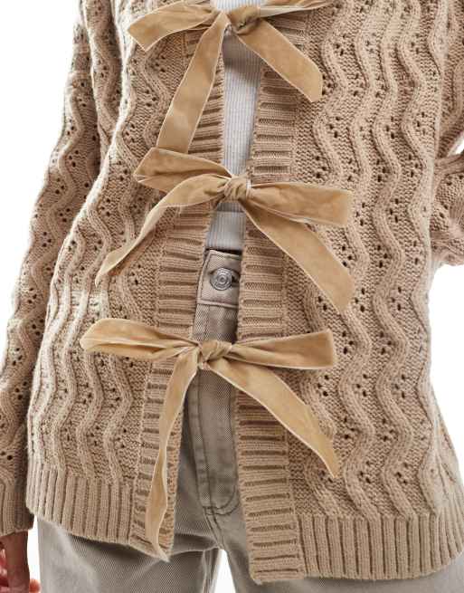 Miss Selfridge cable knit longline cardigan with velvet bow detail in camel