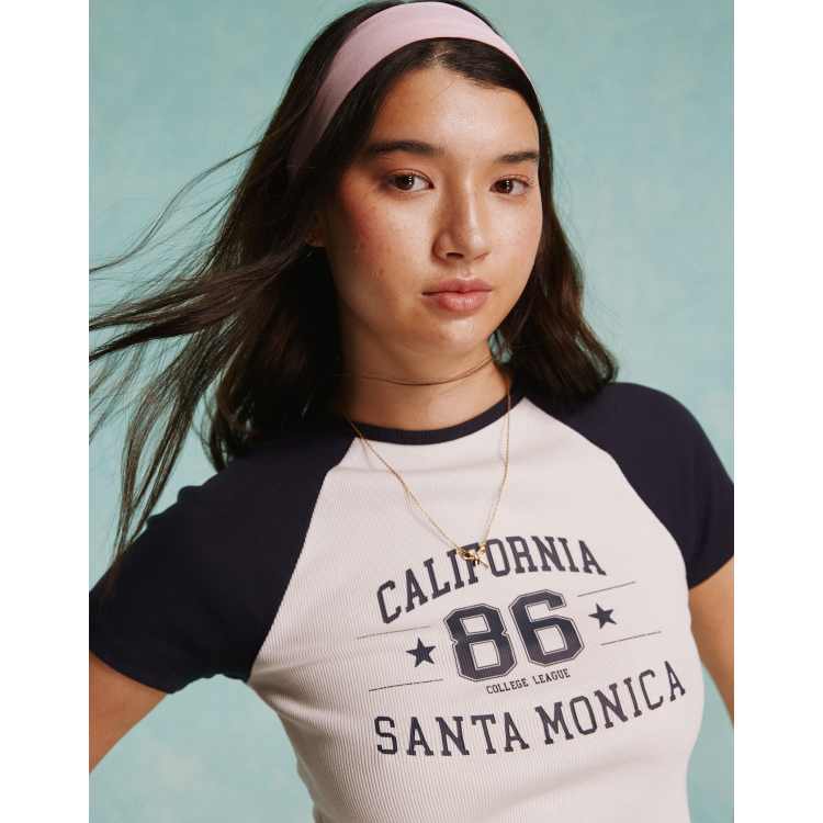 Miss Selfridge California graphic raglan baby tee in cream and navy