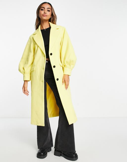 Miss Selfridge - Cappotto lungo in velluto a coste giallo con maniche a sbuffo 