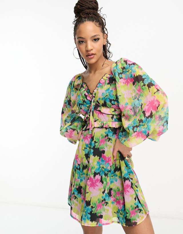 Miss Selfridge chiffon frill detail tiered mini dress in bright blurred floral