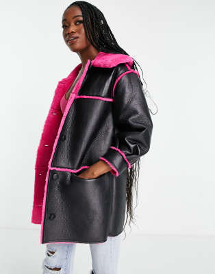 Miss Selfridge contrast faux fur faux leather long line coat in black with pink