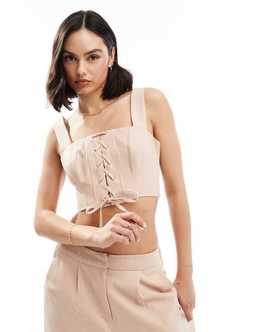 Miss Selfridge - Crop top stile corsetto con lacci rosa gessato in coordinato