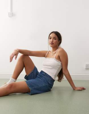 denim jorts in mid wash-Blue