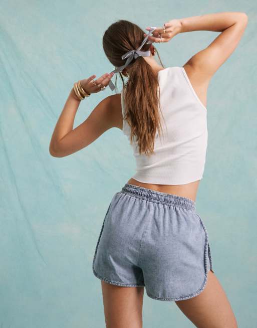 Miss Selfridge denim runner shorts in light blue wash