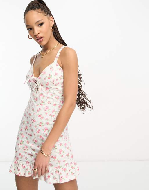 Sisters Of The Tribe ditsy floral cami mini dress with tie straps