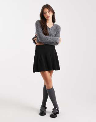 Miss Selfridge - Falten-Minirock aus Strick in Schwarz