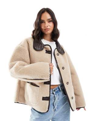 faux fur contrast jacket in cream-White