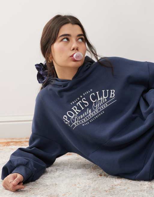 Miss Selfridge - Felpa con cappuccio blu navy oversize con grafica 
