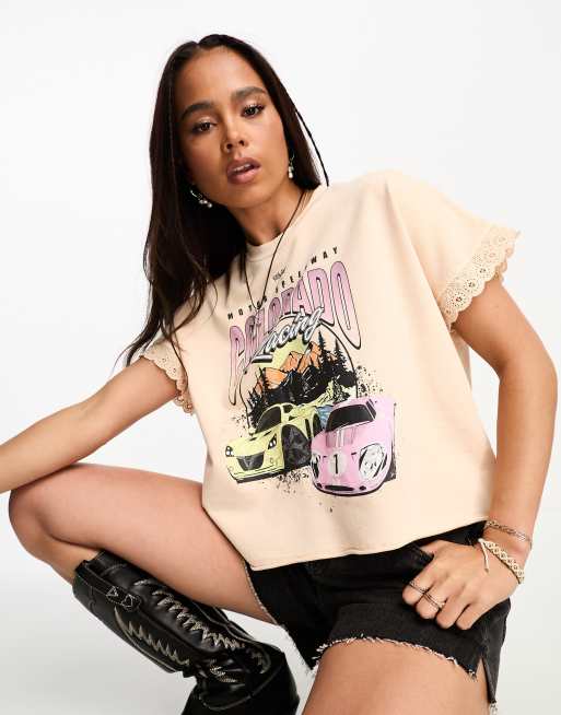 Miss Selfridge festival graphic oversized boxy crop T-shirt with broderie  trim in apricot