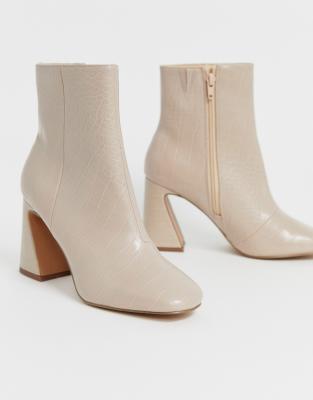 cream heeled boots