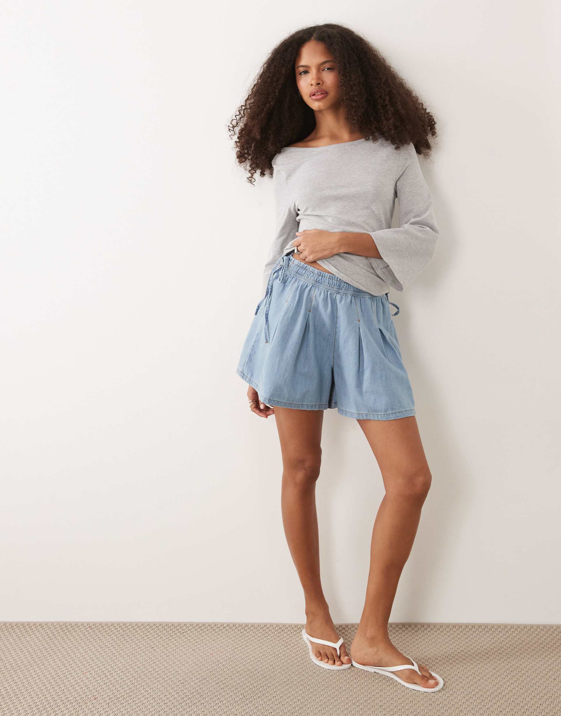 miss selfridge flared shorts with bow detail in mid blue wash