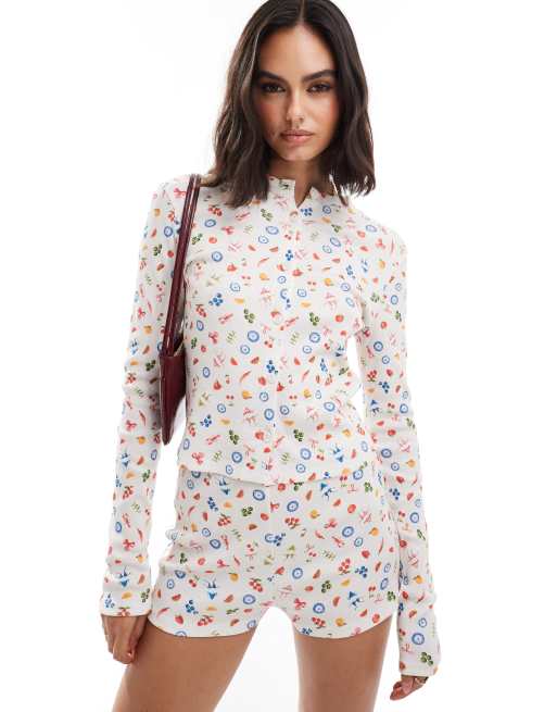 Miss Selfridge – Fruktmönstrad, ribbad kofta