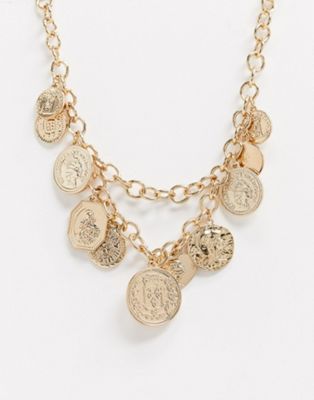 Miss Selfridge – Guldfärgat halsband med flera kedjor och mynthängmycke