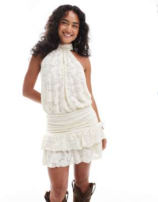 Miss Selfridge - Halbtransparentes Mini-Sommerkleid aus Jacquard-Spitze in Elfenbeinweiß mit Neckholder und Rückenaussch...