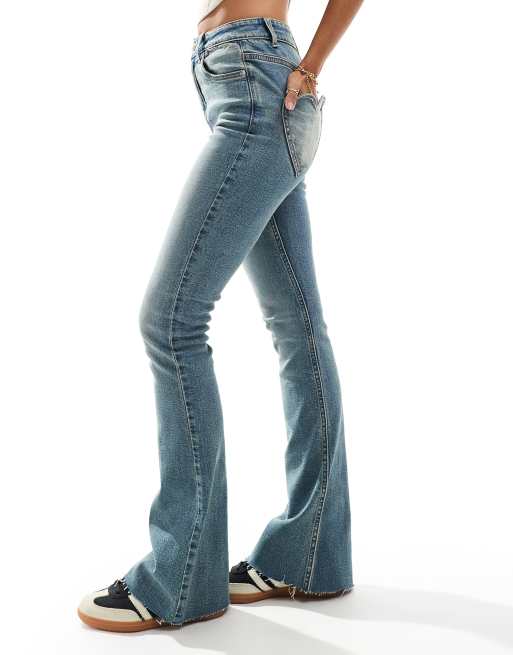 Miss Selfridge heart pocket flare jeans in dirty wash | ASOS