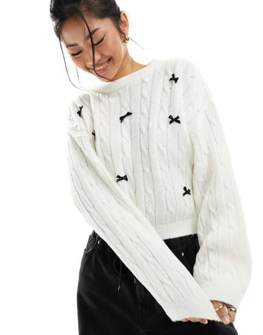 Miss Selfridge – kabelstickad tröja med rosett