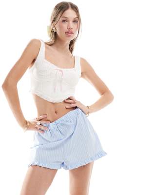 knit corset top with ribbon detail in cream-White