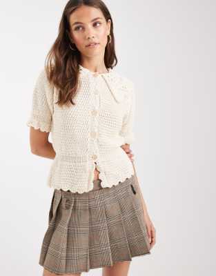 knit peplum top in cream-pink