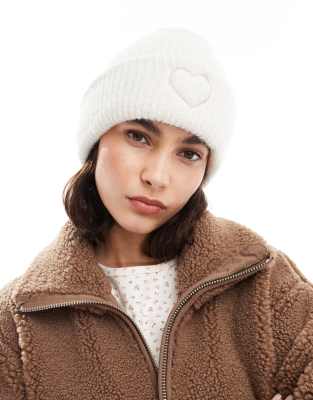 Miss Selfridge Miss Selfridge knitted beanie hat with heart embroidery in cream-White