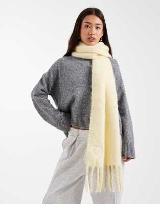 Miss Selfridge Miss Selfridge knitted tassel scarf in buttermilk-Yellow
