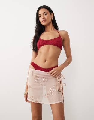 Kurzer, seitlich gebundener Strand-Sarong in Roségold mit Blumen-Paillettenbesatz Gold S