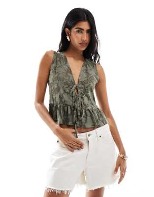 lace sleeveless tie front top in khaki-Green