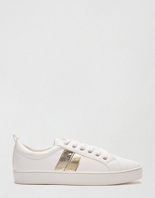 Miss Selfridge lace up trainers in gold