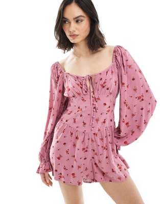 Miss Selfridge - Langärmliger Playsuit in Rosa mit Blümchenmuster-Bunt