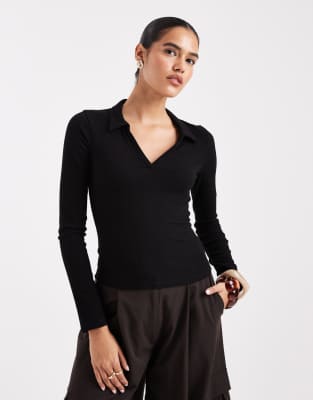 Miss Selfridge - Langärmliges, geripptes Polo-Oberteil in Schwarz-Bunt