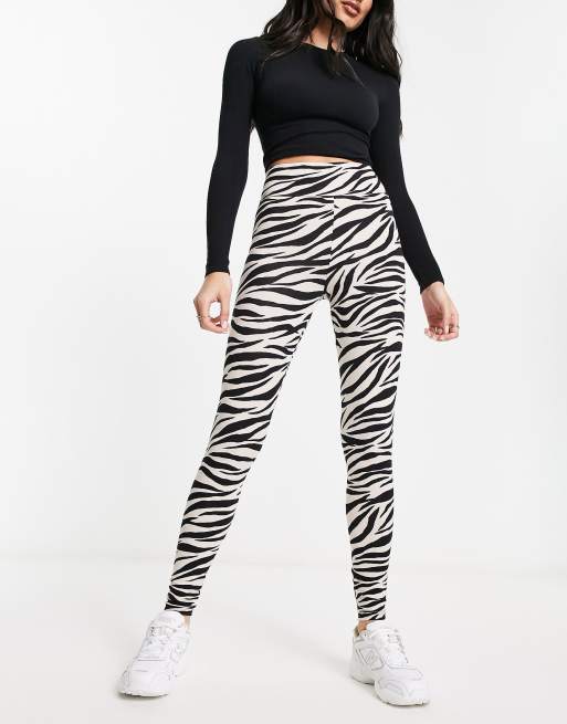 Miss Selfridge – Legginsy z nadrukiem w zebrę