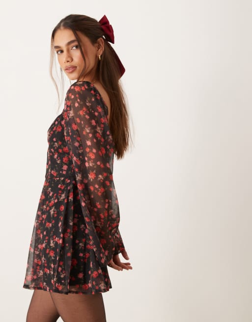 Miss Selfridge long sleeve romper in black ditsy floral print