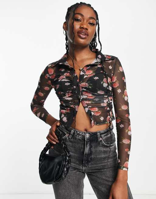 Black mesh top with floral print