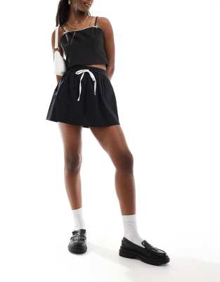 micro mini contrast tie skort in black