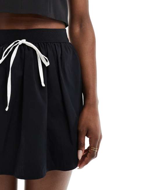 Miss Selfridge micro mini contrast tie skort in black ASOS